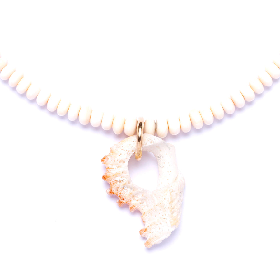 Conch shell and diamond necklace