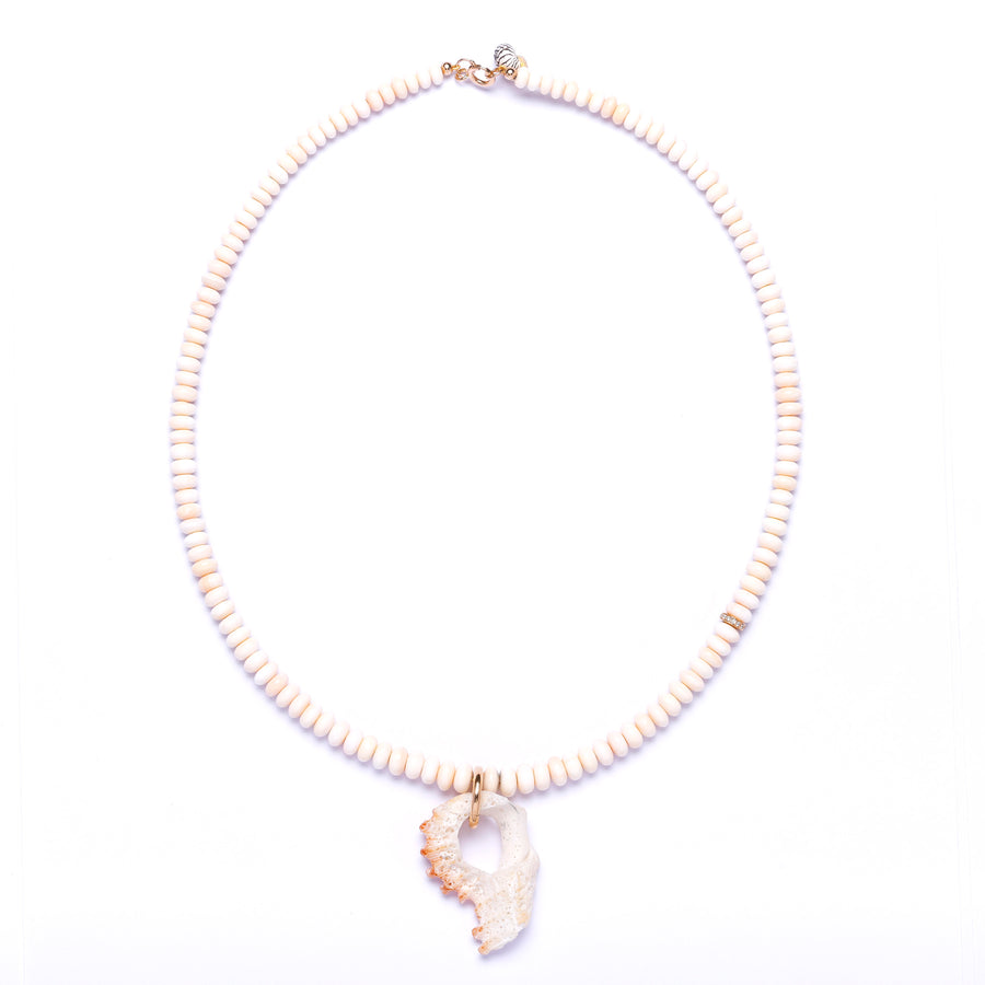 Conch shell and diamond necklace